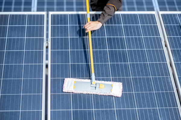 Cleaning solar panels with a soft brush